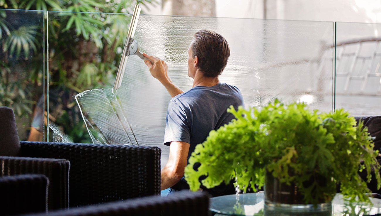 Man cleaning window service-1